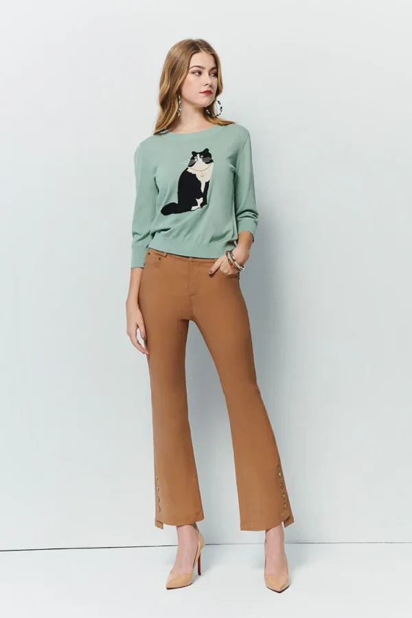 Flared pants with asymmetrical hem breasted