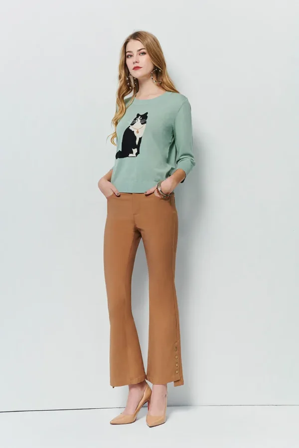 Flared pants with asymmetrical hem breasted